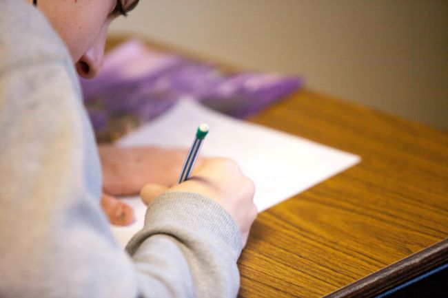 Child undertaking exam